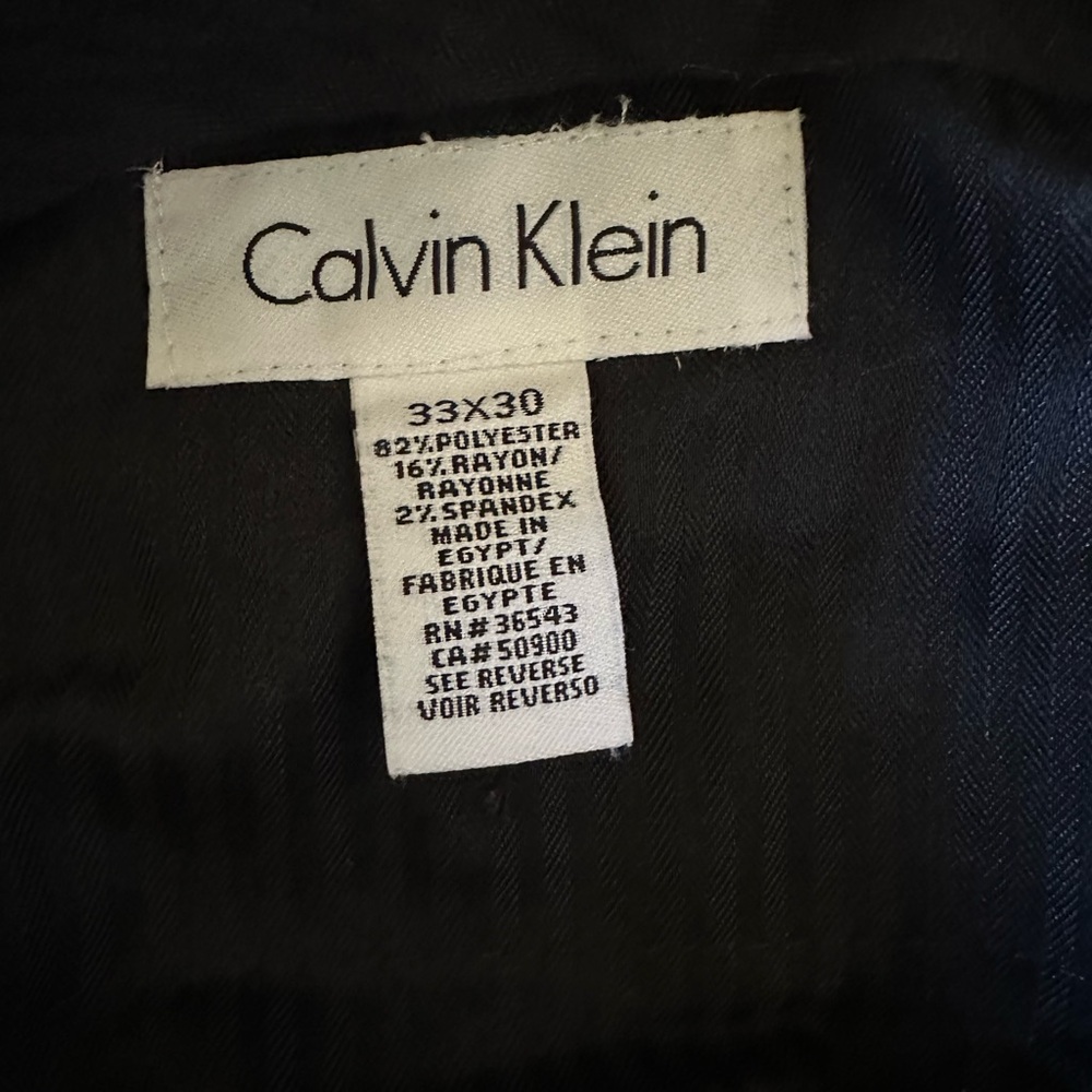 Calvin Klein
33X30
82/POLYESTER
167. RAYON